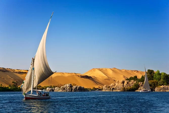 Nile Journey with Aswan's Gods }}